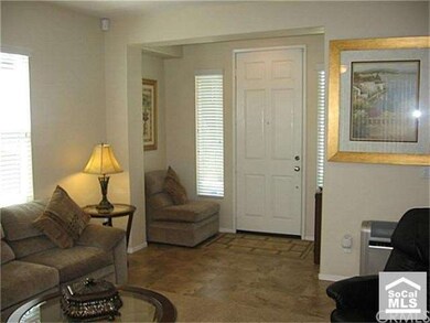 Tile floors at entry, kitchen and hall to garage.