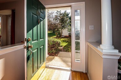 Main door entrance with sunlight streaming in