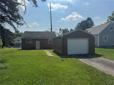BACK OF HOUSE & GARAGE
