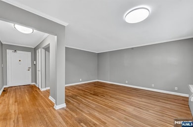 ENTRANCEA AND LIVING ROOM