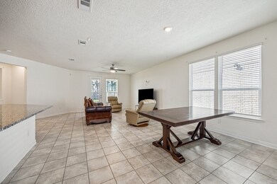 Spacious family room open to the Kitchen.