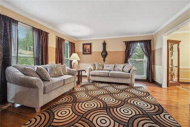 Living area with light hardwood flooring