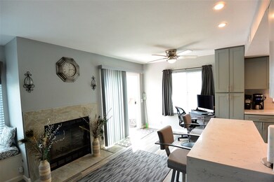 OPEN FLOOR PLAN WITH KITCHEN  THAT OPENS UP TO LIV