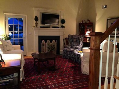 Living Room. with gas fireplace.  Door out to side