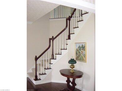 The turned staircase adds a sophisticated touch & 