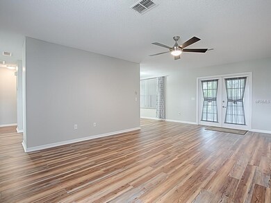 FRENCH DOORS IN BACKGROUND LEAD TO YOUR GLASS-ENCL