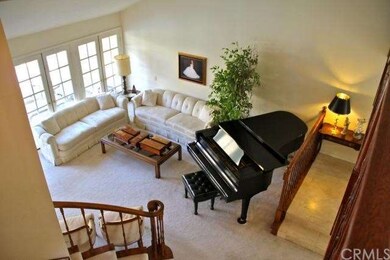 Lovely living room with French doors and windows a