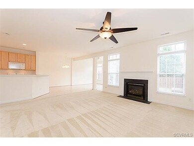 Kitchen is completely open to sun room and family 