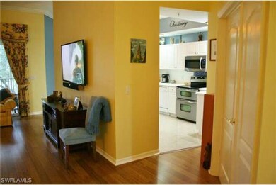 Bamboo floored living area to Kitchen with 18
