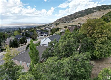 Aerial view of property's location with a mountainous background