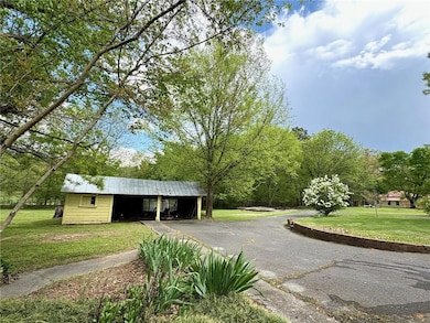 Surrounding community featuring a asphalt driveway