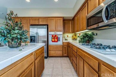 Another view of the kitchen with recessed lighting