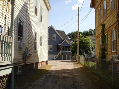 Driveway to rear house and parking area