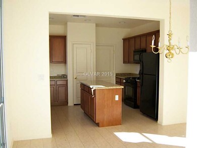 Property Photo. KITCHEN SHOWING DOORS TO PANTRY &