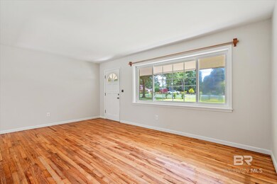 Unfurnished room with light hardwood / wood-style flooring