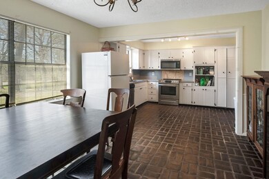 Kitchen with stainless steel appliances, sink, a t