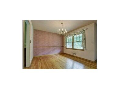 Secondary Bedroom with Hardwood Floors and double 