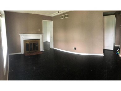 Family room with original hardwood floors