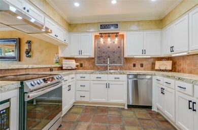 Kitchen featuring appliances with stainless steel
