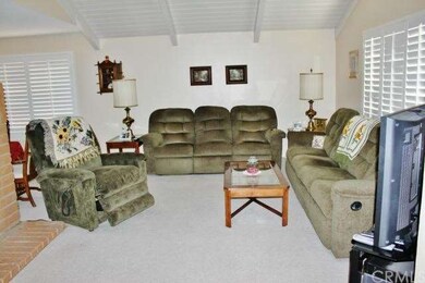 DEN FEATURING VAULTED CEILING, DOUBLE SIDED FIREPL