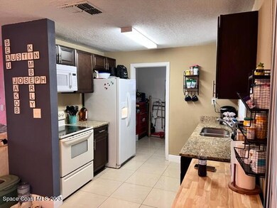 555 Mendel Ln, Titusville, FL 32796 - photo 5