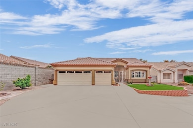 Mediterranean / spanish-style home featuring concr