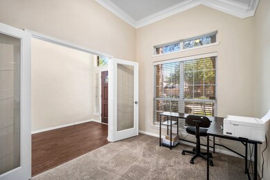 As you enter the home, the office is to the left behind French doors.