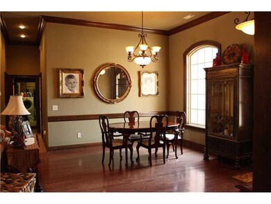 Dining Room. Gorgeous hardwood flooring in formal dinning room that merges into open Living room space