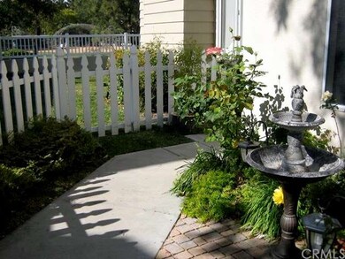 The pathway from the street that leads to the fron