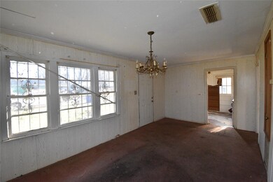 Unfurnished dining area featuring visible vents, c