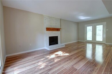 FAMILY ROOM: The spacious family room boast brand 