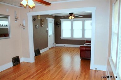 Gleaming refinished hardwood floors and new windows throughout only begin your list of 