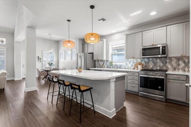 Kitchen with appliances with stainless steel fini