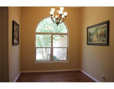 Dining Room. Beautiful hqrdwoods in this stunning formal dining room.