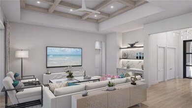 Living room featuring beamed ceiling, a high ceili