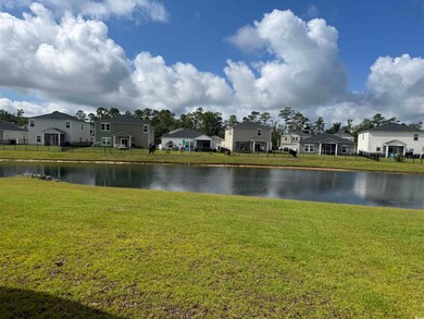 Water view with nearby suburban area