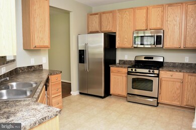 7559 Stoney Run Dr unit 102, Hanover, MD 21076 - photo 2