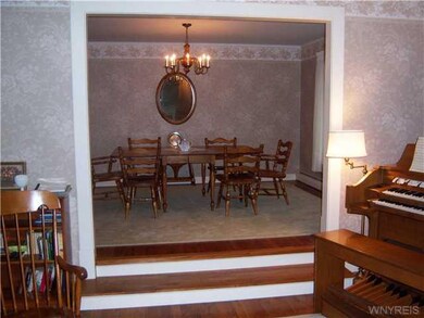 Dining Room. Living room is two-steps down from di