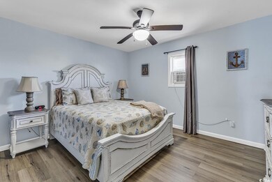 Bedroom with hardwood / wood-style flooring, cooli