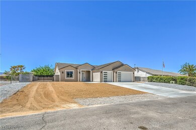 Single story home with concrete driveway, an attac