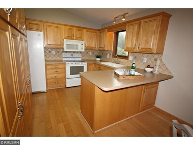 Beautiful hardwood floors compliment the abundance