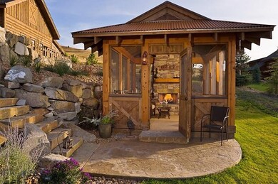3 season pavilion with fireplace next to the water