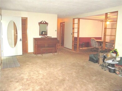 Open Floor plan to Dining Area & Kitchen.
