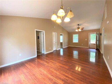 Additional view of living room and dining area