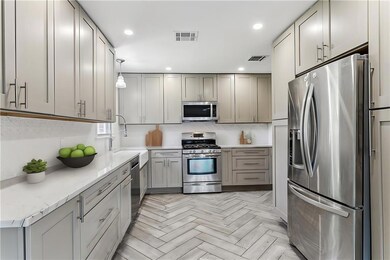 Kitchen is virtually staged.