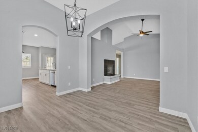 Unfurnished living room featuring light wood-style
