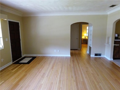 Newly refinished original red oak floors in the fo
