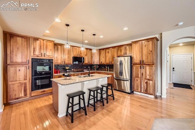Kitchen featuring appliances with stainless steel 