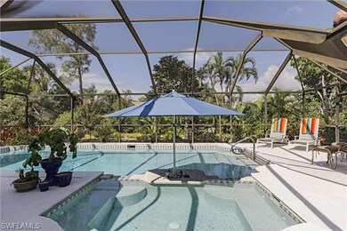Oversized pool with swim up stools.  Spa.  Removab
