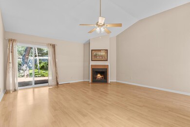 Unfurnished living room with vaulted ceiling, a c